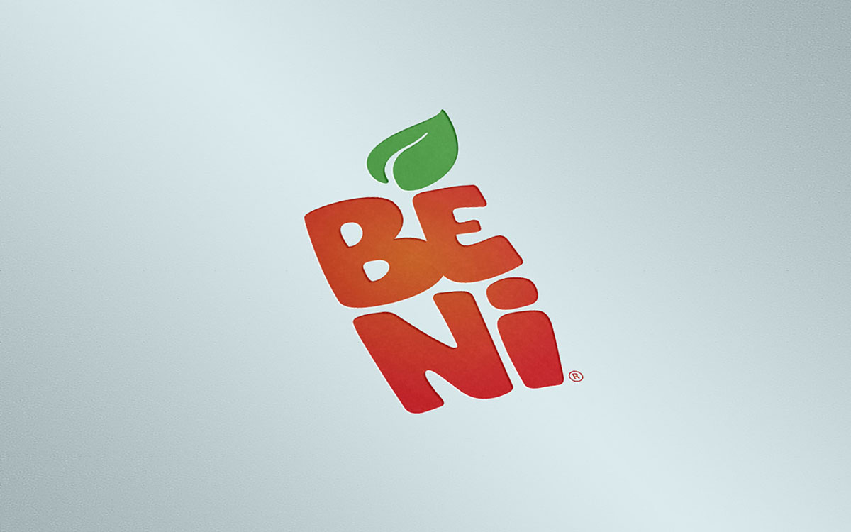 The Beni logo in colour: BE over NI in orange to red letters, a green leaf on top